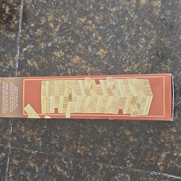 This is a brand new, never opened Jenga tumbling tower game - Picture 2 of 4